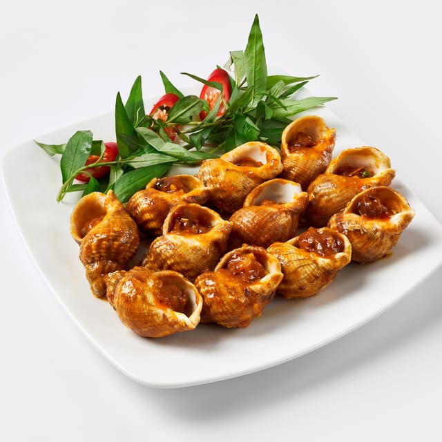 Ốc Hương Xào Me - Tamarind Stir-Fried Sea Escargot.